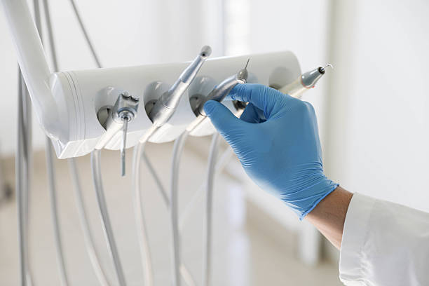 Professional Tooth Extraction technician working in Occoquan, VA